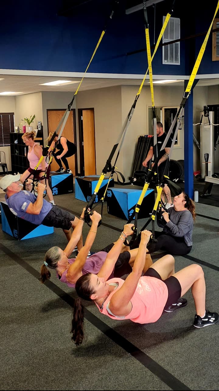 Full30Fit members completing a coached suspension-training workout.