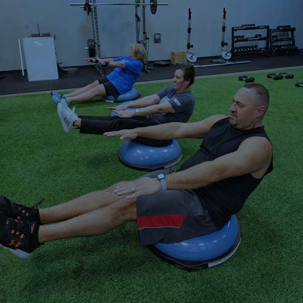 Full30Fit members moving through a coached group workout.